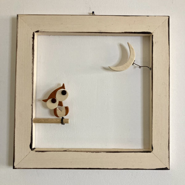 Gufo che si interroga sulla luna